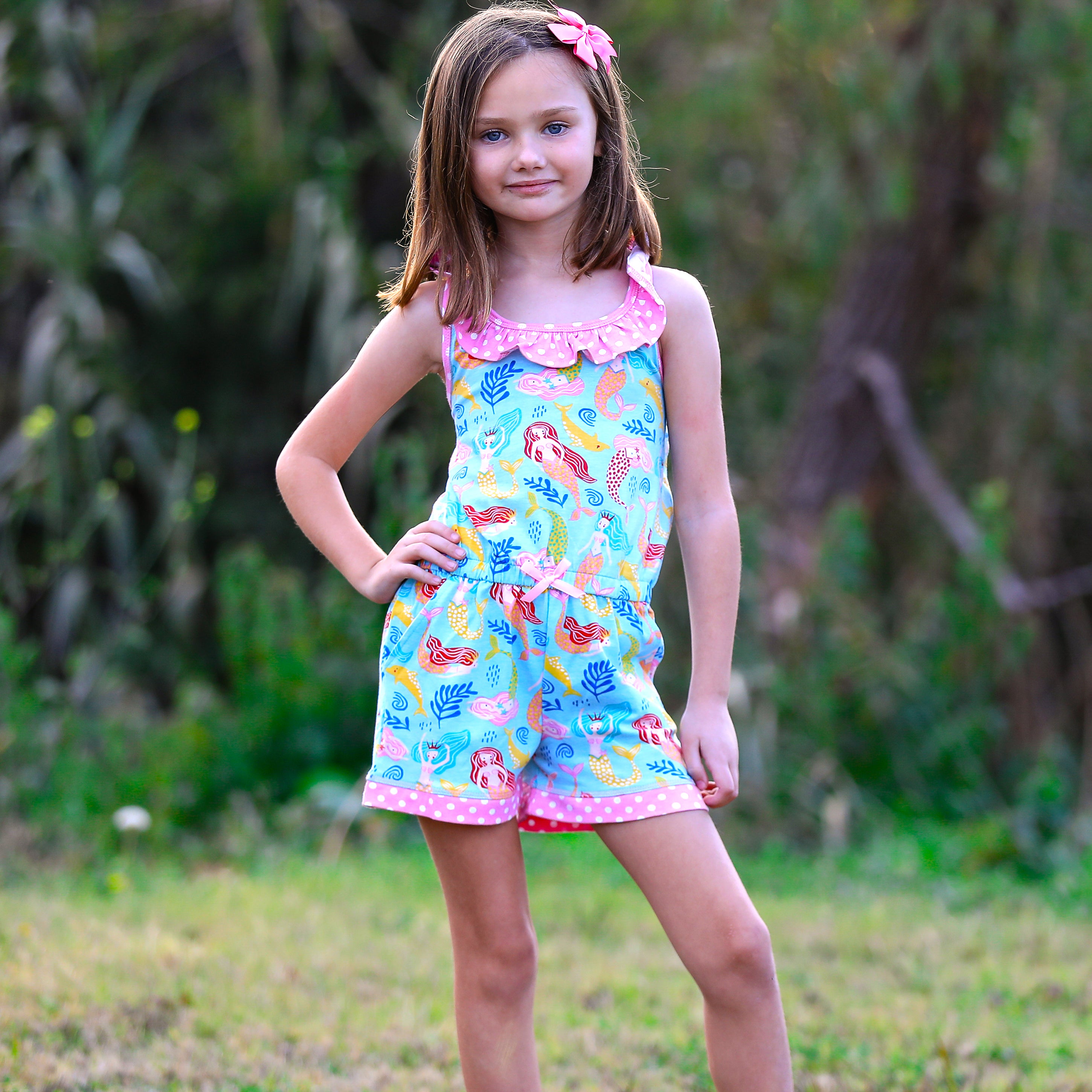 AnnLoren Girls Boutique Nautical Mermaid Jumpsuit featuring criss-cross straps and a bow, perfect for spring and summer.